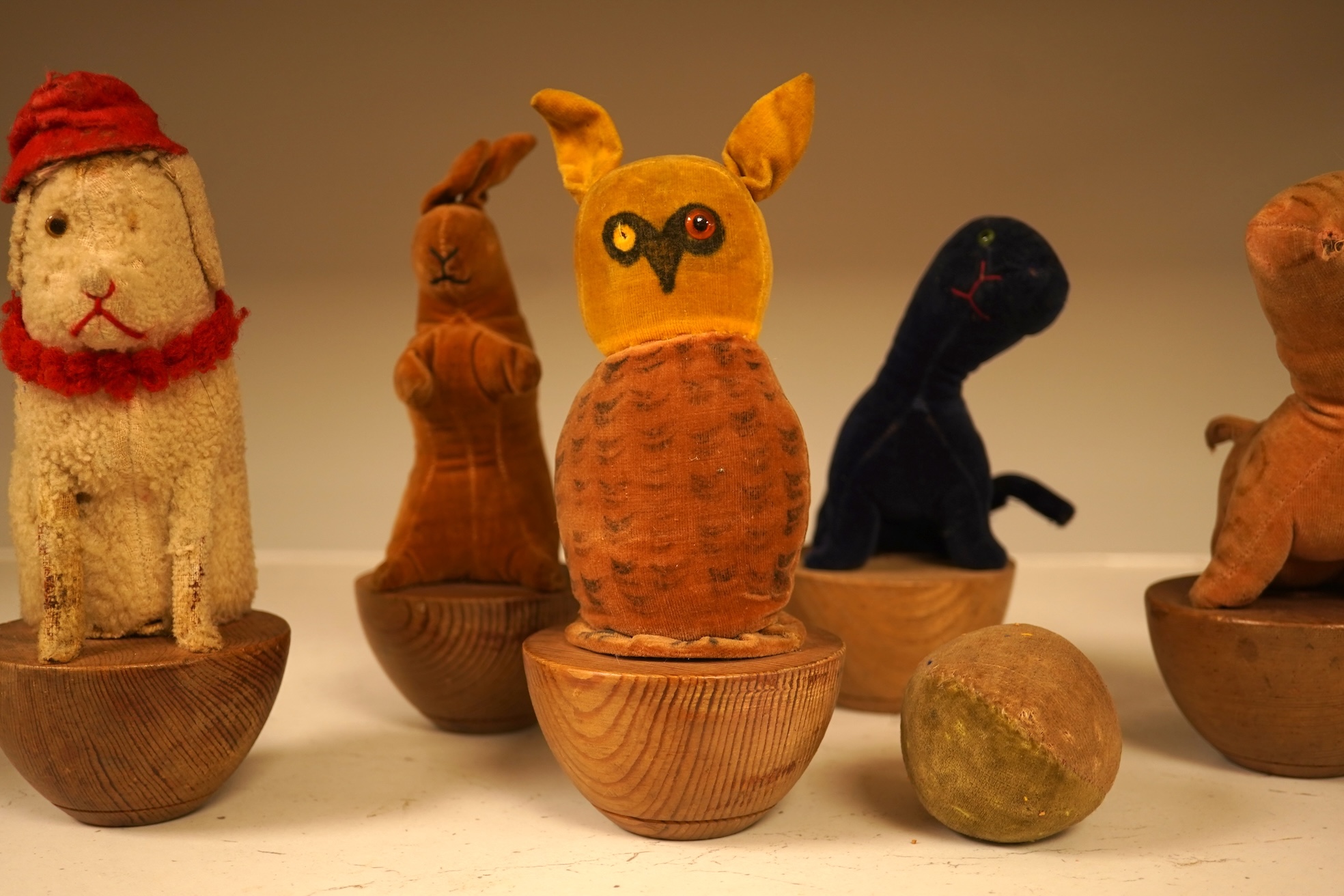 Nine children’s toy 1930’s-40’s soft animal skittles and a ball. Monkey skittle 17cm high